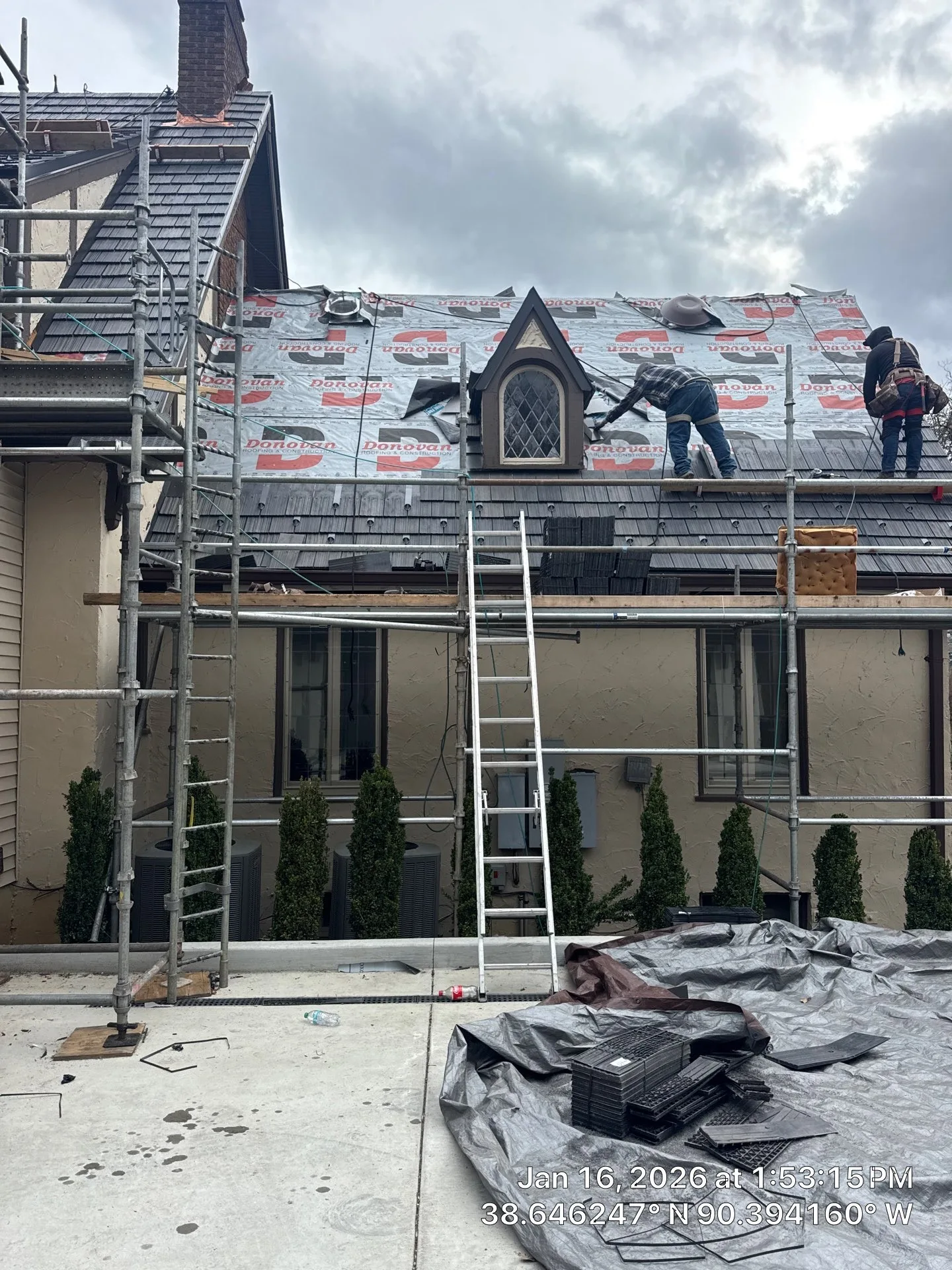 Cedar shake roof under installation