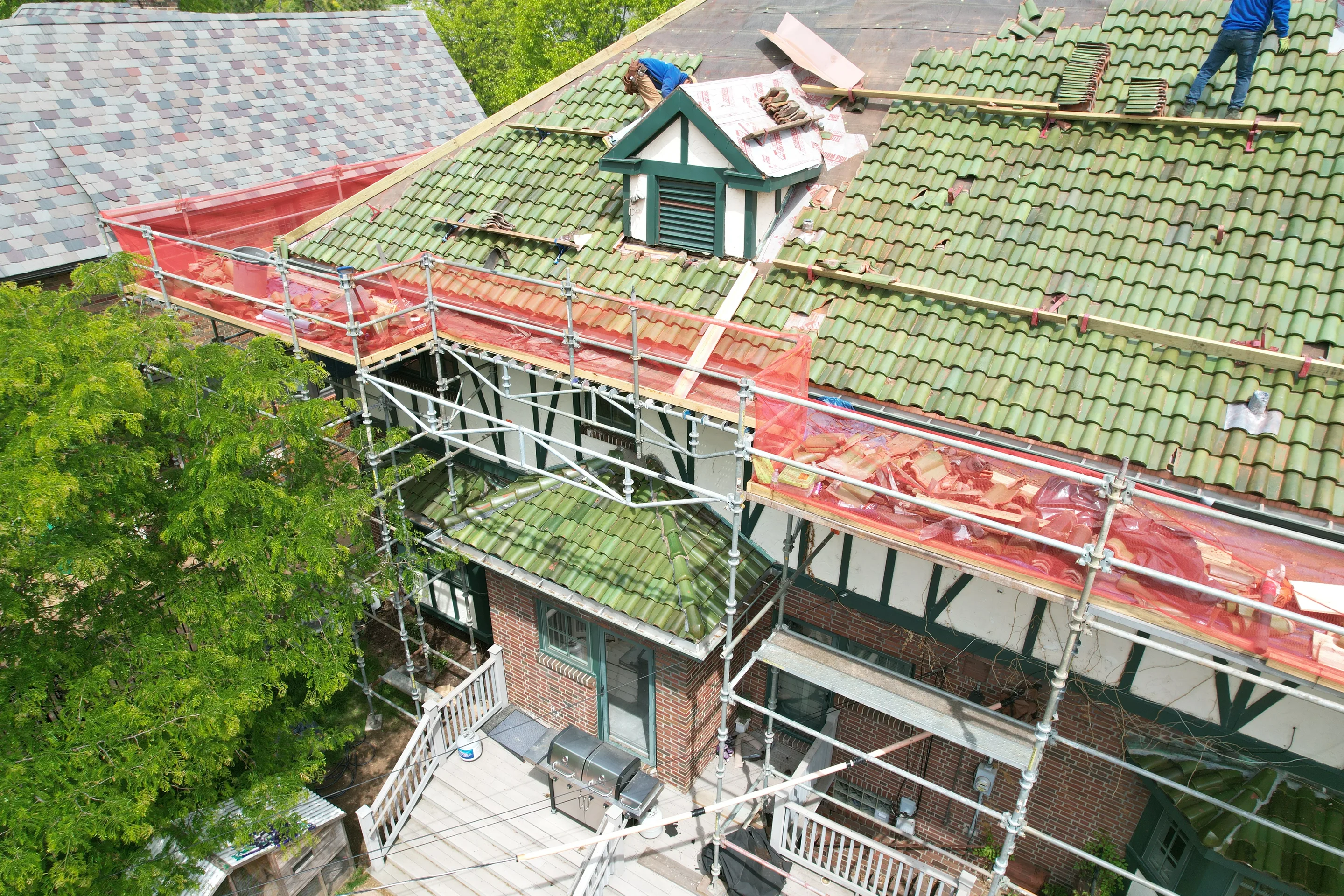 Green clay tile install in progress