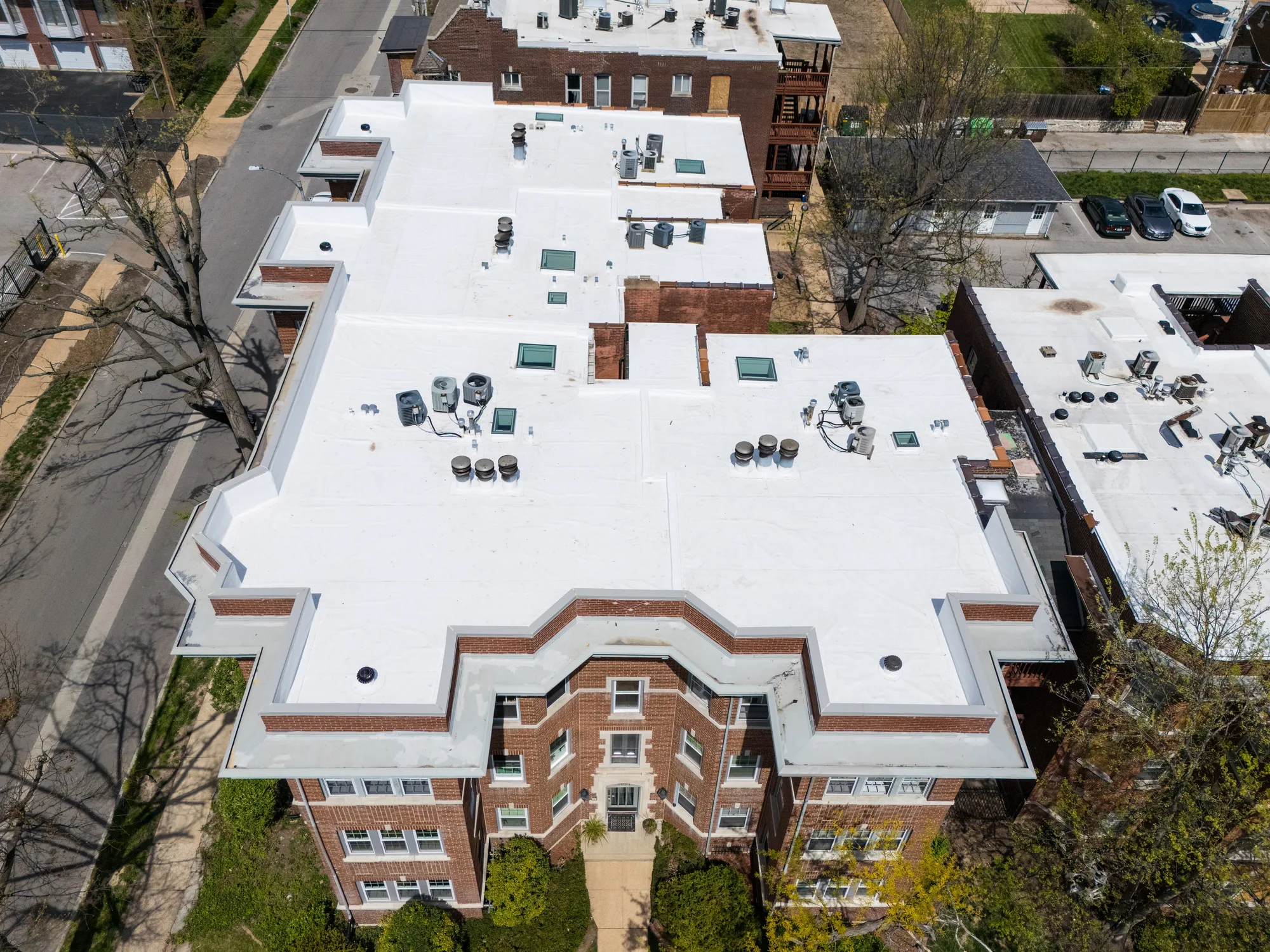 Front aerial of the brick entry towers with the new membrane behind