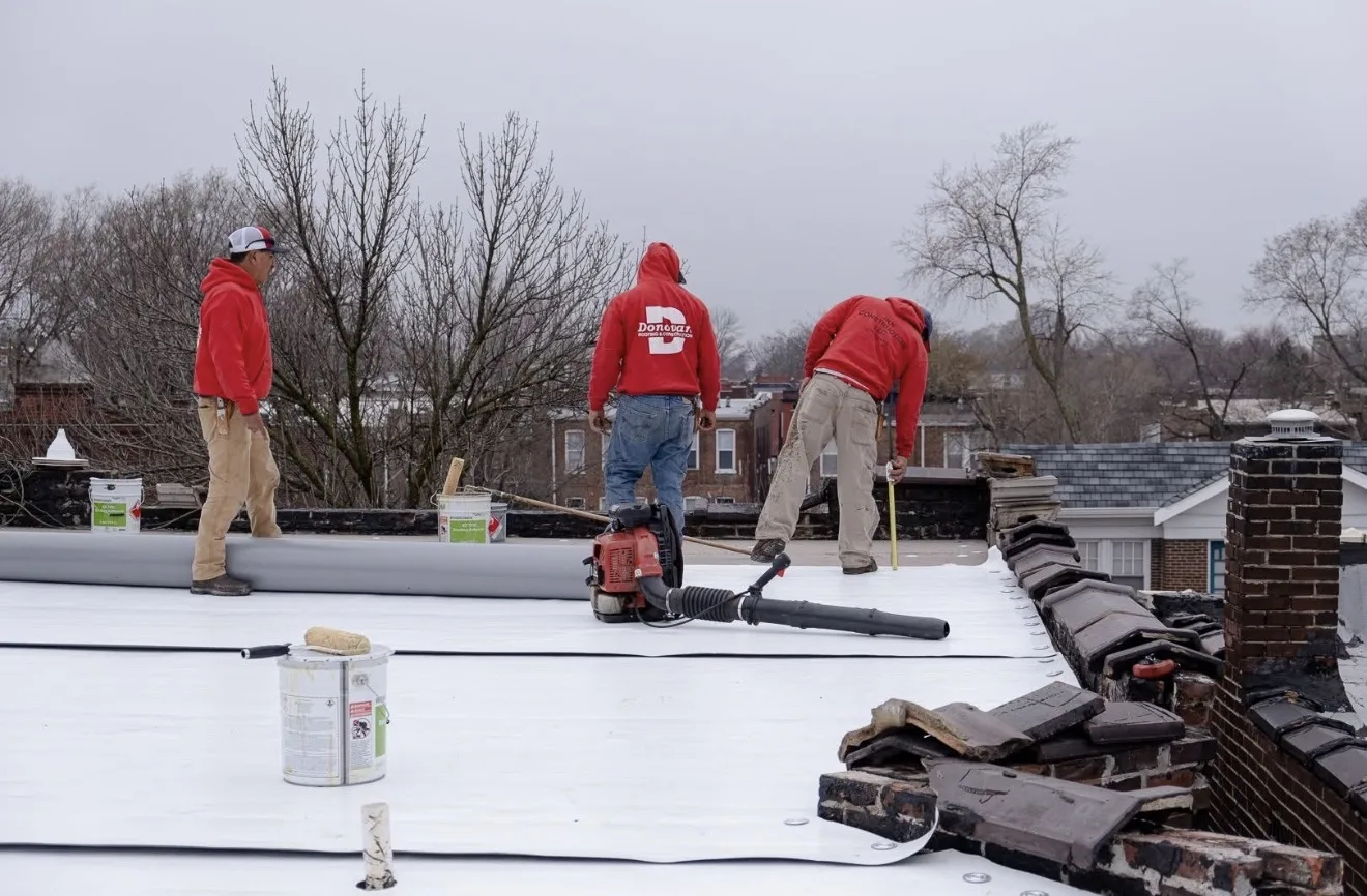 Crew working a TPO flat roof